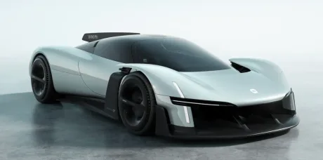 Mașină electrică modernă cu un design futurist și aerodinamic.